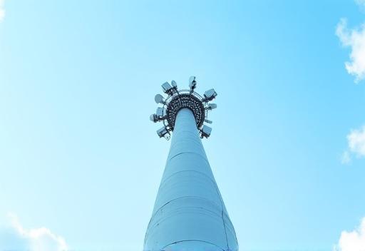 Broadcast transmission mast against sky